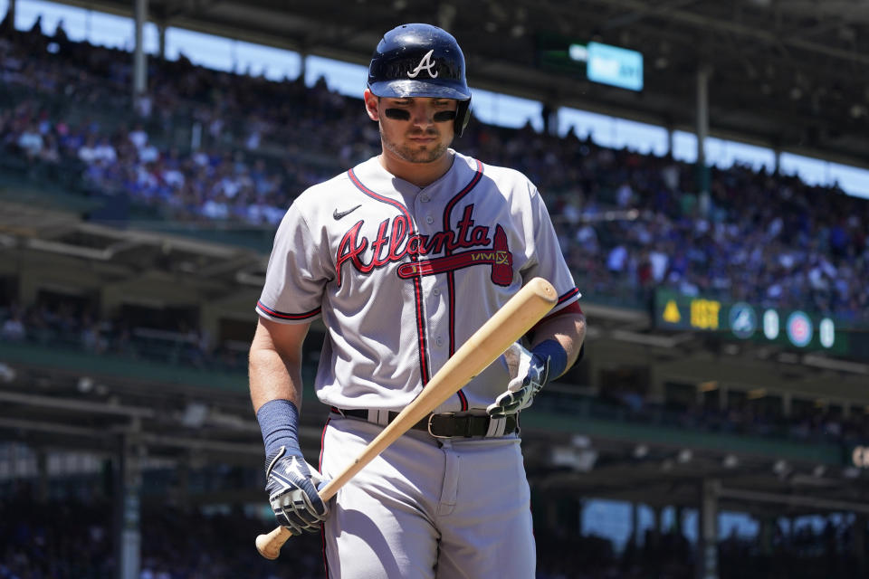 Atlanta Braves' Austin Riley walks to the dugout after striking out swinging during the first inning of a baseball game against the Chicago Cubs in Chicago, Friday, June 17, 2022. (AP Photo/Nam Y. Huh)