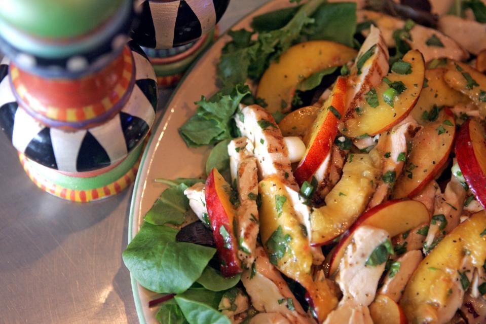 Chicken and Nectarine Salad comes from a chef-shared recipe at a gourmet shop.