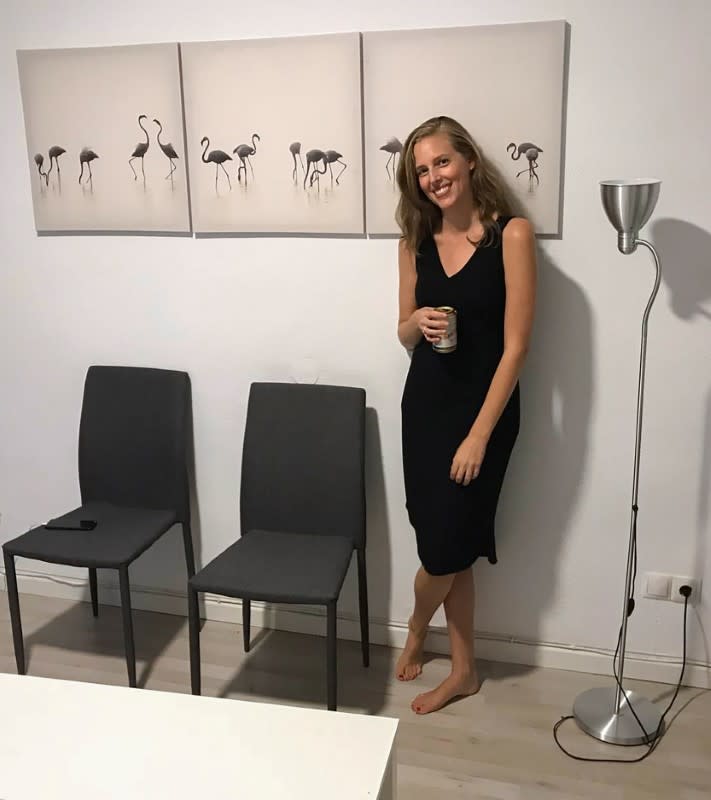 Kellyn Bechtold, a former contestant on the U.S. reality TV show Survivor, poses for a selfie in an apartment where she is awaiting the end of the partial lockdown over the coronavirus outbreak in Malaga