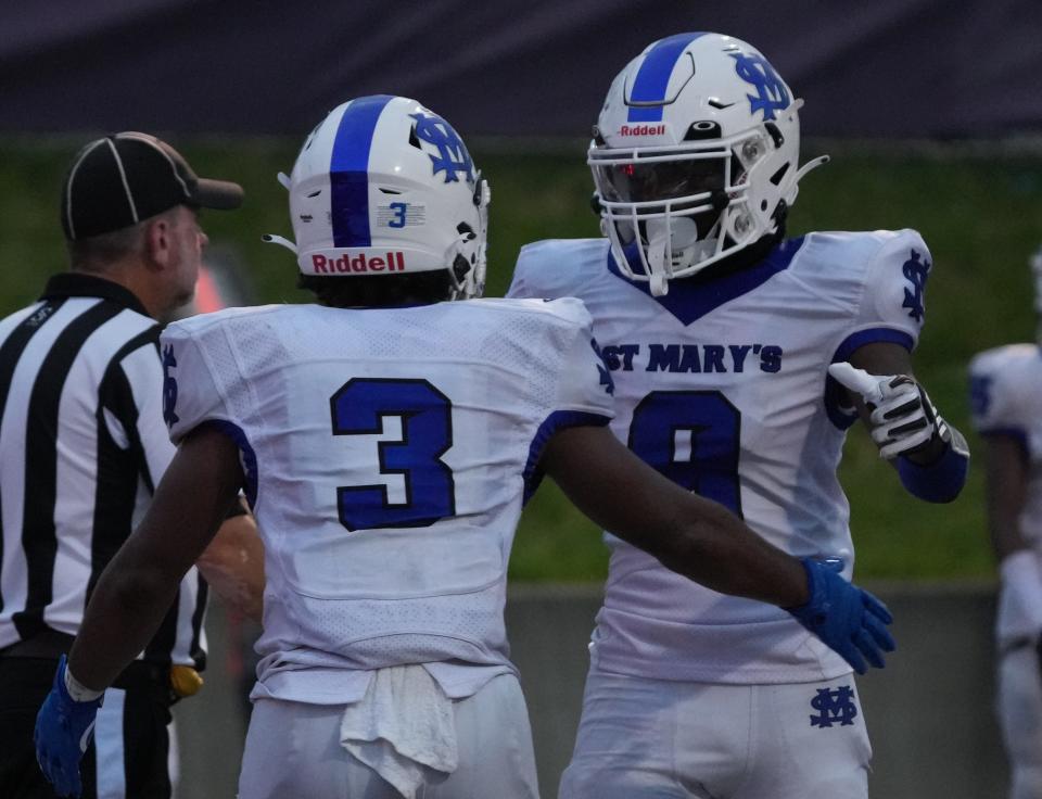 Garfield, NJ August 25, 2023 -- Nasir Owens and Kazier White of St. Mary celebrate a TD in the second half. St. Mary came to Garfield to take on the Boilermakers in high school football. St. Mary won the game 35-14.