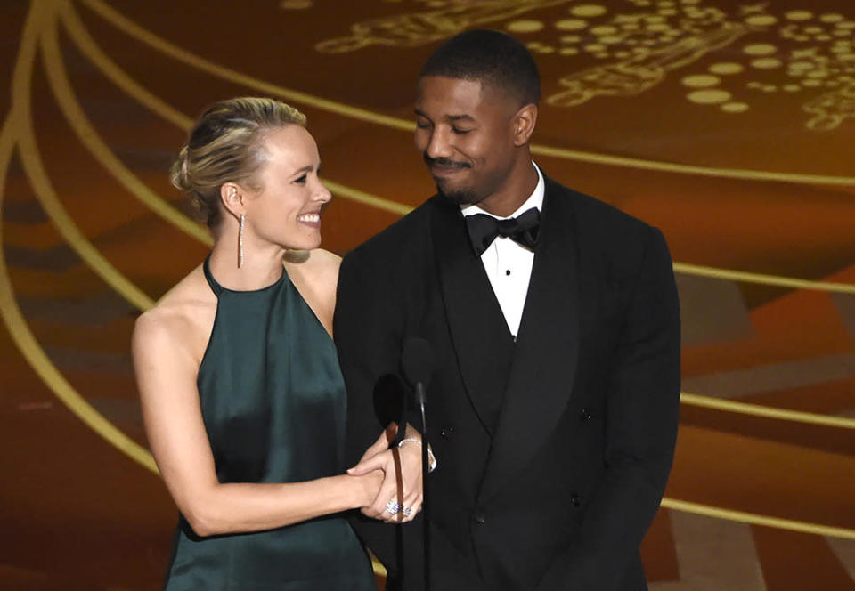 Rachel McAdams, left, and Michael B. Jordan present the award for best cinematography at the Oscars on Sunday, Feb. 28, 2016, at the Dolby Theatre in Los Angeles. 