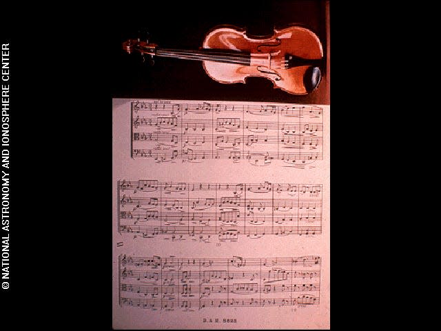 A photo of a musical score with a violin was included on the record.