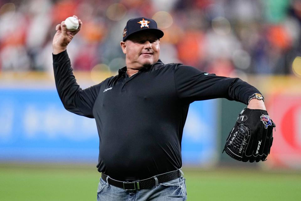 Former Astros player Roger Clemens throws out a ceremonial pitch in 2022.