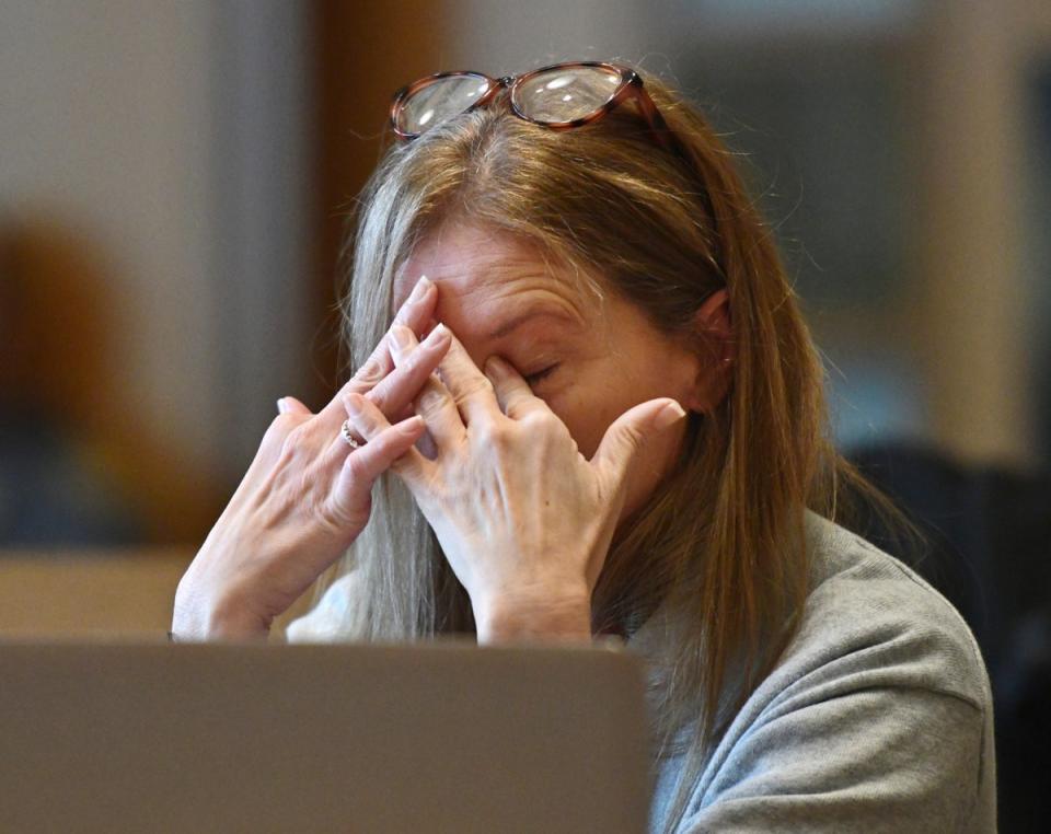 Michelle Troconis sheds a tear as her first interview with Connecticut State Police is presented as evidence  (AP)