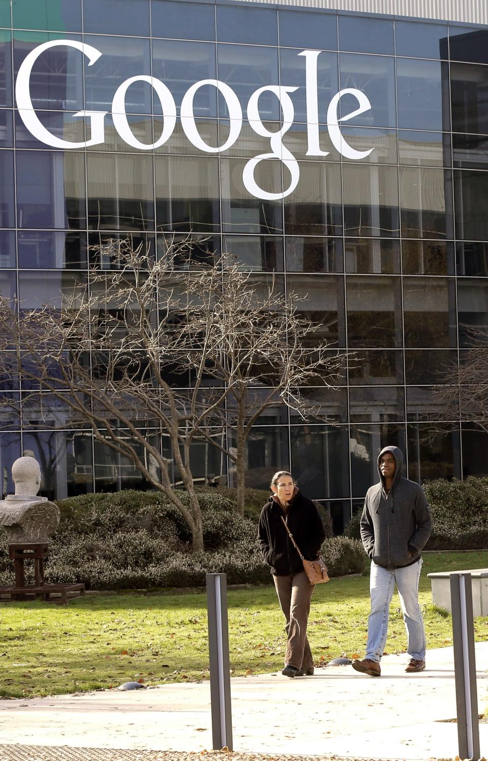 FILE - This Thursday, Jan. 3, 2013, file photo shows a Google sign at the company's headquarters in Mountain View, Calif. Investors for years have seemingly adored technology stocks as much as most people love their smartphones. But Wall Street has suddenly soured on Silicon Valley and the rest of tech, triggering a stomach-churning downturn likely to leave millions queasy, should they check the damage to their investment portfolios in Oct. 2018. (AP Photo/Marcio Jose Sanchez, File)