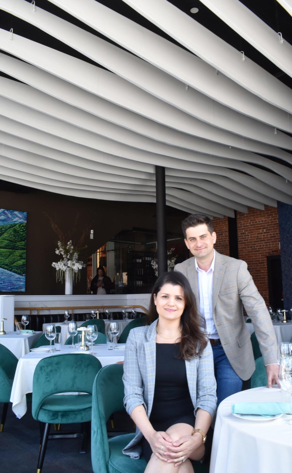 Paulo Filogenio and Ariane De Carvalho in Duoro Steakhouse restaurant within Towne House Restaurant in Fall River.