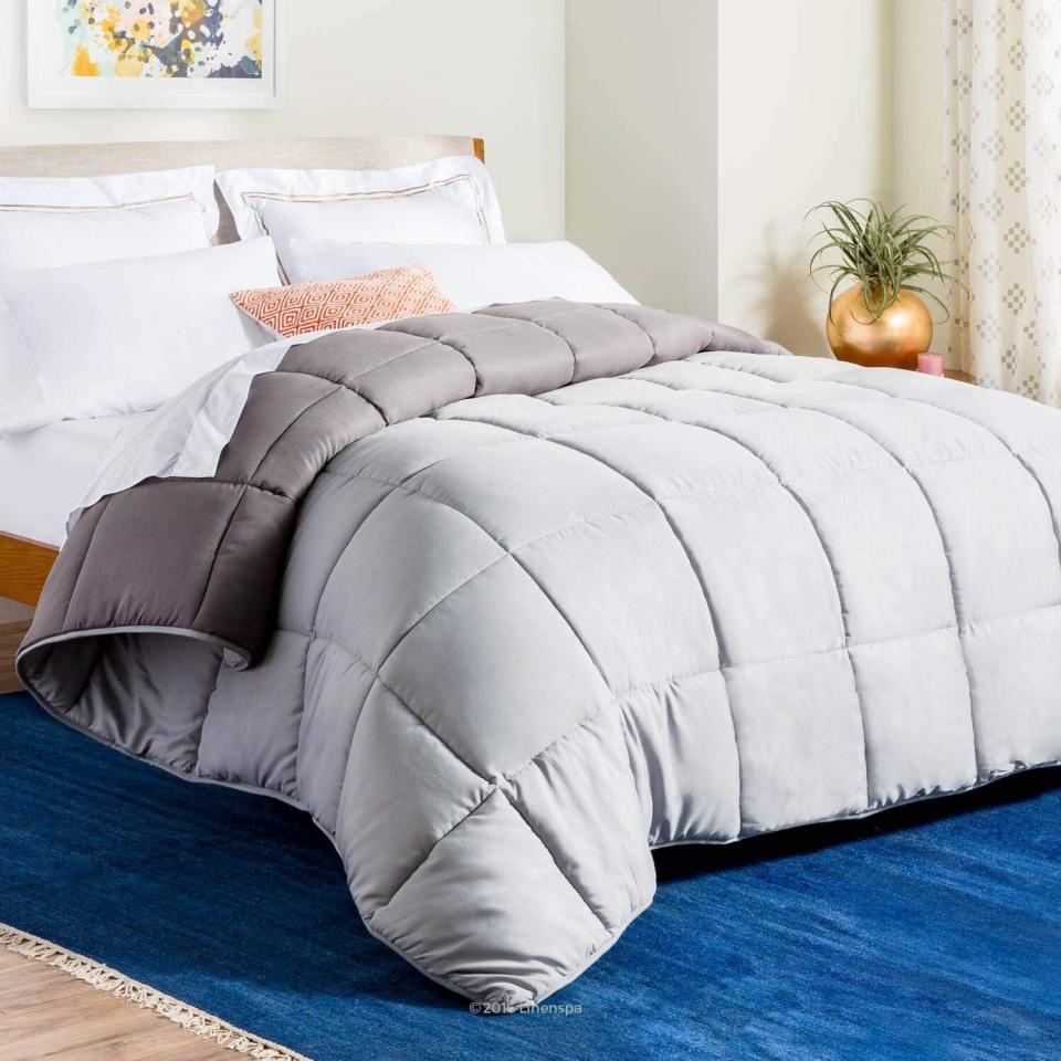 It's made of down alternative that is ACTUALLY MACHINE-WASHABLE. Seriously, leave the bedding and home goods that require dry cleaning behind. And it's reversible, so you can get a lil' versatile with your bedding scheme.<br /><br /><strong>Promising review:</strong> "It's so fluffy! As soon as I got it I threw it in the dryer with some dryer sheets and when it came out it was fluffier than before. I threw it on my bed and my dog immediately jumped up on it and hasn't left since. He enjoys it and so do I." &mdash; <a href="https://www.amazon.com/gp/customer-reviews/R3FR33X9L7OULT?ASIN=B01GF5HM6I&amp;ie=UTF8&amp;linkCode=ll2&amp;tag=huffpost-bfsyndication-20&amp;linkId=15289d760be00bd7b807fde4d0abf48c&amp;language=en_US&amp;ref_=as_li_ss_tl" target="_blank" rel="noopener noreferrer">Amazon Customer</a><br /><br /><strong><a href="https://www.amazon.com/Linenspa-All-Season-Reversible-Alternative-Comforter/dp/B01GF5HM6I?&amp;linkCode=ll1&amp;tag=huffpost-bfsyndication-20&amp;linkId=95c1eeaa522c9a37bd16e03fc5eb7af4&amp;language=en_US&amp;ref_=as_li_ss_tl" target="_blank" rel="noopener noreferrer">Get it from Amazon for $39.99+ (available in eight sizes and 10 colors).</a></strong>