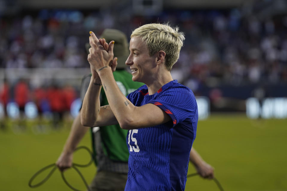 United States forward Megan Rapinoe walks the field applauding for fans after a soccer game against South Africa, Sunday, Sept. 24, 2023, in Chicago. (AP Photo/Erin Hooley)