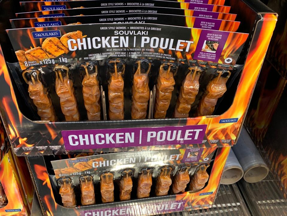 black and orange backs of stacked Chicken Souvlaki at costco