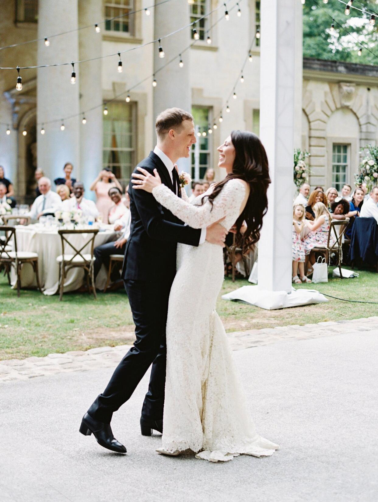 bride and groom sharing first dance