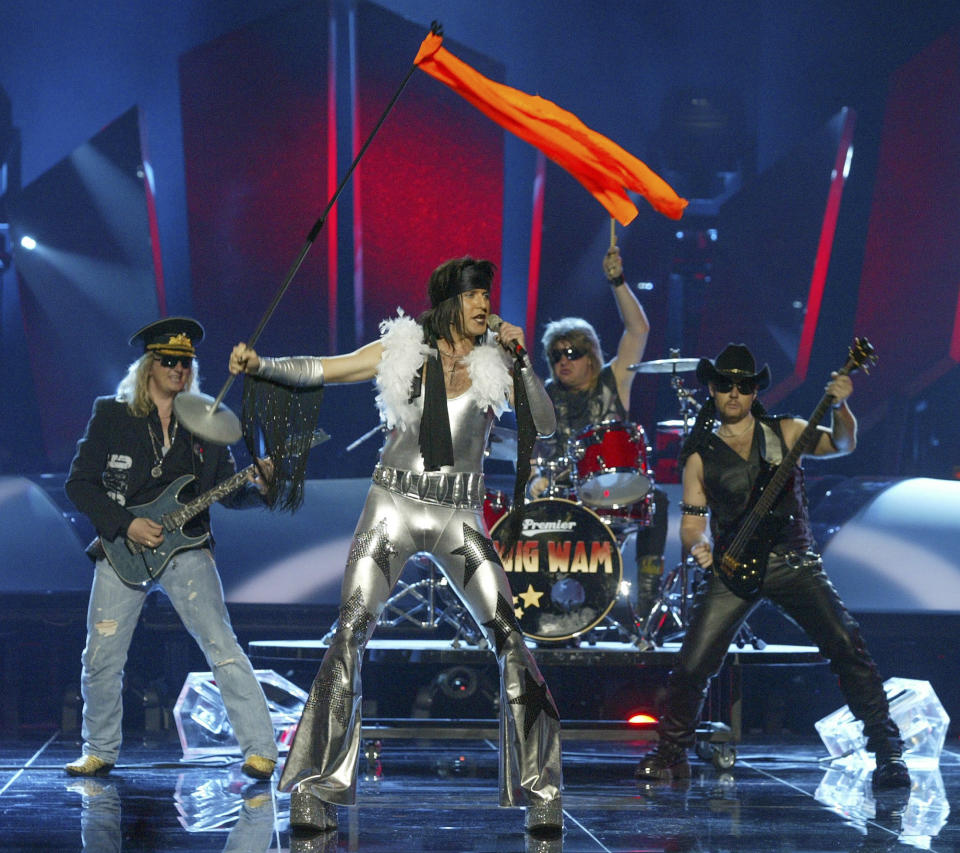 File - The WIG WAM group of Norway perform during the semi-final dress rehearsal of the Eurovision song contest in Kiev, Ukraine, May 18, 2005. Since 1956, the Eurovision Song Contest has provided catchy tunes, cheesy pop and bombastic anthems - but also some eye-catching fashion. (AP Photo/ Sergey Ponomarev, File)