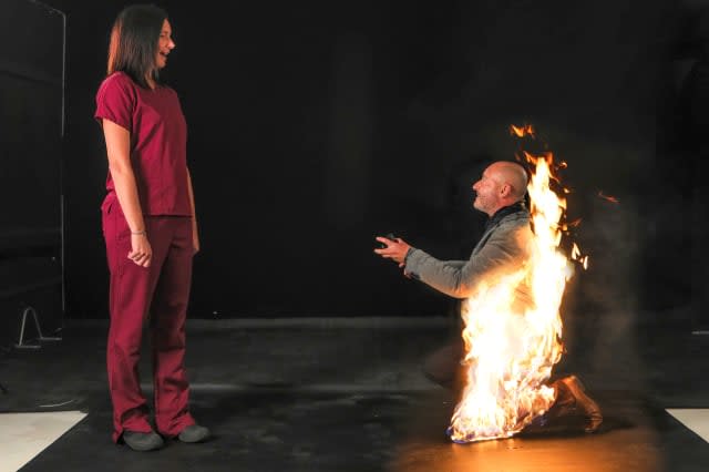 A professional stuntman is thought to have become the world's first person to propose to his fiancée whilst being on fire.