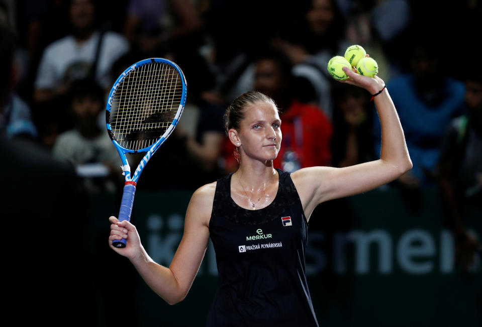 Karolina Pliskova acknowledges the crowd at the Singapore Indoor Stadium after her victory over Caroline Wozniacki at the WTA Finals Singapore on 21 October, 2018. PHOTO: Reuters/Edgar Su