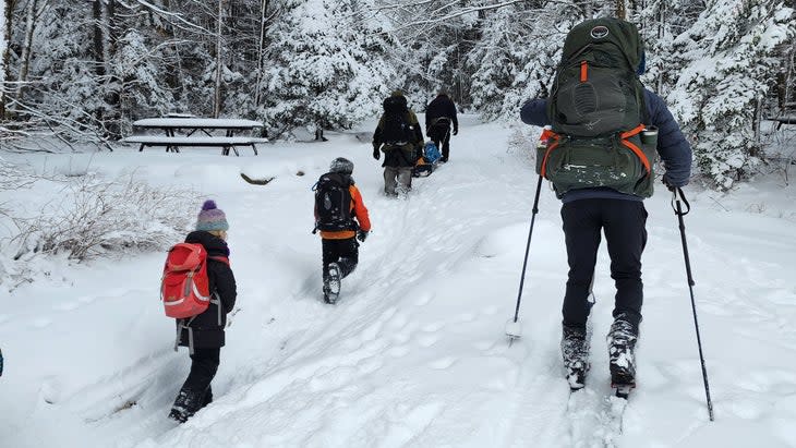 <span class="article__caption">Little ones make the snowy trek into one of the cabins run by the Vermont Hut Association.</span> (Photo: Travis Thiele)