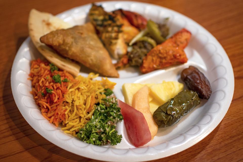 A view of a plate of food from the iftar buffet offered by Mandi House in Tempe on April 25, 2022.