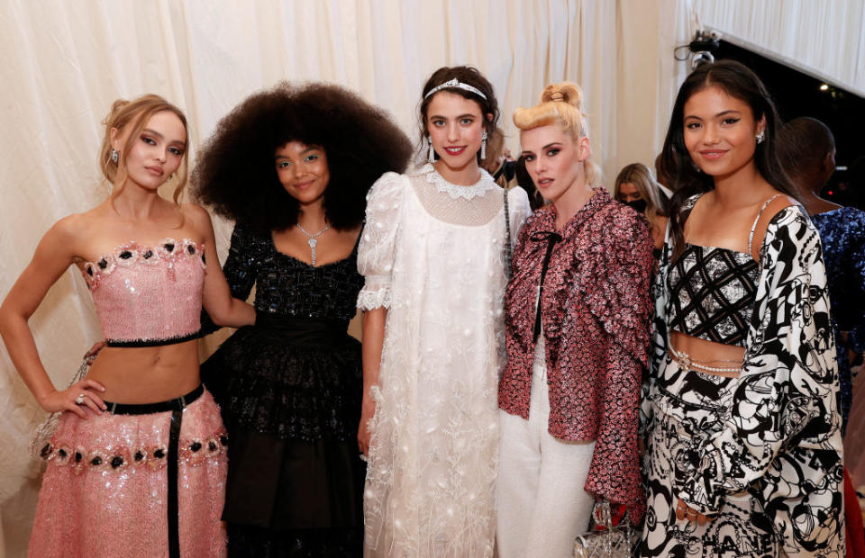 Emma Raducanu looks right at home posing with (L-R) Lily-Rose Depp, Whitney Peak, Margaret Qualley and Kristen Stewart at last night's Met Gala. (Getty Images)