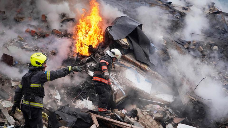 PHOTO: Rescuers work the scene of a building damaged by Russian rocket attack in Kharkiv, Ukraine, Tuesday, Jan. 23, 2024. (Andrii Marienko/AP)