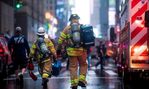 A helicopter crashed on the roof of a skyscraper in midtown Manhattan early on Monday afternoon. One person, reportedly the pilot, was killed. In a tweet around 2pm on a day of rain and low cloud that obscured the tops of many tall buildings in the city, the Fire Department of New York (FDNY) said: “FDNY members are operating on scene at 787 Seventh Avenue in Manhattan, helicopter crash landing.” The New York police department subsequently said the incident was a “hard landing on the roof” of the building. “Fire has been extinguished,” an NYPD tweet said, adding that people should avoid the area between West 51st Street and 7th Avenue. The FDNY said work was continuing “in response to fuel leaking from the helicopter” and said: “There is currently one fatality reported.” A White House statement said Donald Trump had “been briefed on the helicopter crash in Manhattan and continues to monitor the situation”. The Federal Aviation Administration (FAA) said it was “gathering information” on the crash. The building at 787 Seventh Avenue, close to Broadway theaters and Times Square, is the 54-storey Axa Equitable Center. It opened in 1986 to much comment about its extensive displays of corporate art. As the New York Times reported, such displays included “murals by Thomas Hart Benton displayed in the lobby; large-scale wall commissions by such well-known contemporaries as Roy Lichtenstein and Sol LeWitt and massive sculptures by Barry Flanagan and Scott Burton.” On Monday police, cordoned off the blocks around the building, barring access to reporters. A police official told the Guardian that although the fire from the crash had been contained, authorities were continuing to clear more of the area because of concerns about falling debris. Wanda Tucker, who works at legal firm on the 21st floor of the building, was there when the helicopter hit. “I was just coming upstairs from lunch,” she said, “and a coworker asked me if I felt the building shake. Then they just told us that we have an emergency situation and that we had to evacuate the building.” Talking to reporters, New York governor Andrew Cuomo referred to common anxieties around initial reports of such incidents, as when a small plane flew into a tall building on the Upper East Side in 2006. “If you are a New Yorker,” he said, “you have a level of PTSD from 9/11. And I remember that morning all too well. So as soon as you hear an aircraft hit a building, I think my mind goes where every New Yorker’s mind goes.” Tucker said “someone got word” what happened while she was in the building stairwell. Asked what went through her head, she said: “9/11.” She said: “I know a lot of people where having anxiety. Once you get stuck you don’t know what’s going to happen.” On getting out of the building, Tucker said, she called her family and then her boss, to let them know she was safe. Helicopter crashes are not unknown in and around the steepling buildings of midtown and lower Manhattan. Last year, five people died when a sightseeing flight crashed into the East River, in which three people died in a crash in 2011. In 2009, not far from the scene of Monday’s crash, nine people were killed when a sightseeing helicopter collided with a small plane. On Monday, outside the exclusion zone imposed around the skyscraper, on 53rd Street between Sixth and Seventh avenues, a Metropolitan Transportation Authority (MTA) worker called Michael, who declined to give his surname, said that though he did not see the crash, he “heard a helicopter going by”. He said: “I figured they were headed to the heliport on 34th Street. I said, ‘It’s flying too low. It sounded like a freight train.” Then there was silence. “I thought he was trying to make an emergency landing,” he said.