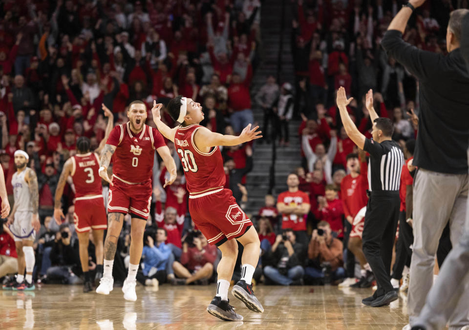 Nebraska's Keisei Tominaga (30) celebrates after hitting a 3-point shot with 28.7 seconds remaining in the second half of an NCAA college basketball game against Northwestern, Saturday, Jan. 20, 2024, in Lincoln, Neb. Nebraska defeated Northwestern 75-69. (AP Photo/Rebecca S. Gratz)