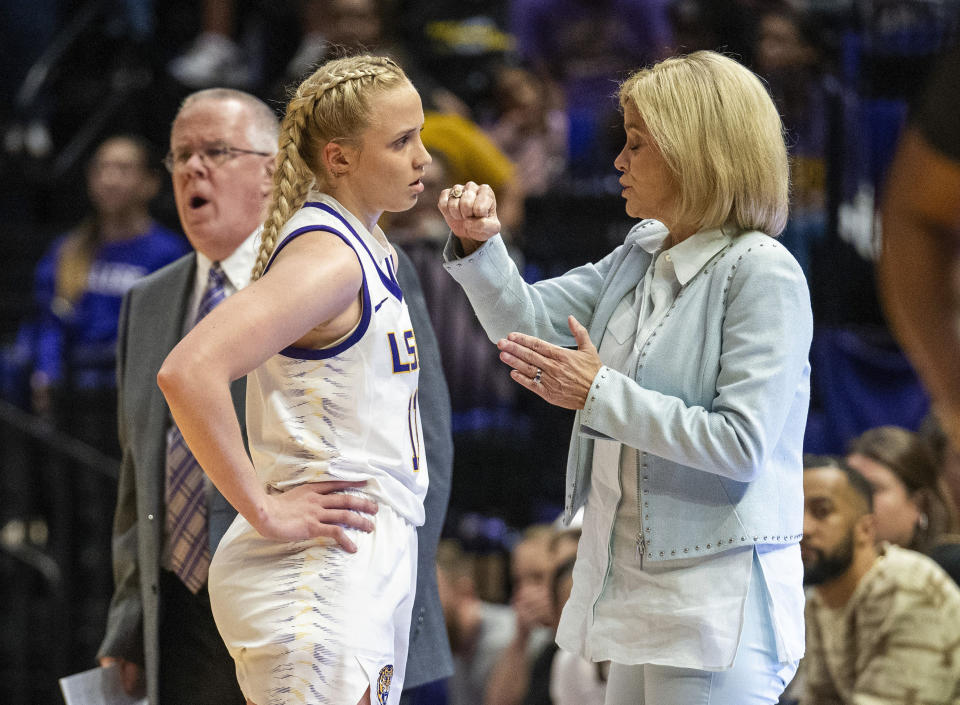 LSU head coach Kim Mulkey, right, talks with guard Hailey Van Lith (11) during a break in the second period against Texas Southern during an NCAA college basketball game Monday, Nov. 20, 2023, in Baton Rouge, La. (Michael Johnson/The Advocate via AP)