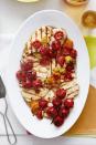 <p>For an easy way to add some extra flavor to your basic chicken cutlet, spoon on some roasted cherry tomatoes tossed with tarragon.</p><p>Get the <a href="https://www.goodhousekeeping.com/food-recipes/healthy/a45701/roasted-baby-vine-tomato-grilled-chicken-recipe/" rel="nofollow noopener" target="_blank" data-ylk="slk:Roasted Baby Vine Tomato Grilled Chicken recipe;elm:context_link;itc:0;sec:content-canvas" class="link "><strong>Roasted Baby Vine Tomato Grilled Chicken recipe</strong></a><em>.</em></p>