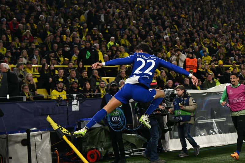 Atletico's Mario Hermoso celebrates scoring his side's first goal during the UEFA Champions League quarter-finals, second leg soccer match between Borussia Dortmund and Atletico Madrid at Signal Iduna Park. Federico Gambarini/dpa