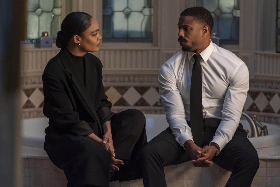 This image released by MGM shows Tessa Thompson, left, and Michael B. Jordan in a scene from "Creed III." (Eli Ade/MGM via AP)