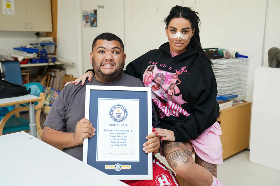 Katie Price and her son Harvey, after he was presented with the Guinness World Record for the longest drawing of a train. Picture date: Thursday July 13, 2023. (Photo by Jacob King/PA Images via Getty Images)