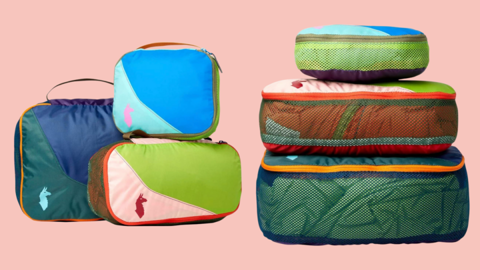 Cotopaxi Cubos Travel Cubes are made with repurposed materials, colourful packing cubes on pink background