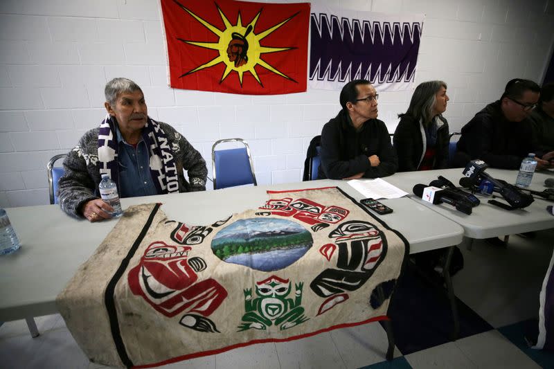 First Nations members of the Tyendinaga Mohawk Territory and Wet'suwet'en Nation speak at a news conference at the Mohawk Community Centre in Tyendinaga