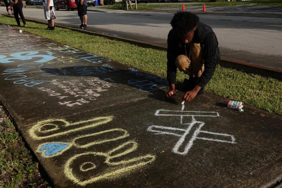 Fans daubed the pavement with tributes to XXXTentacion (AP)