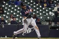 Atlanta Braves' Austin Riley hits a two-run scoring single during the third inning of a baseball game against the Milwaukee Brewers Friday, May 14, 2021, in Milwaukee. (AP Photo/Morry Gash)