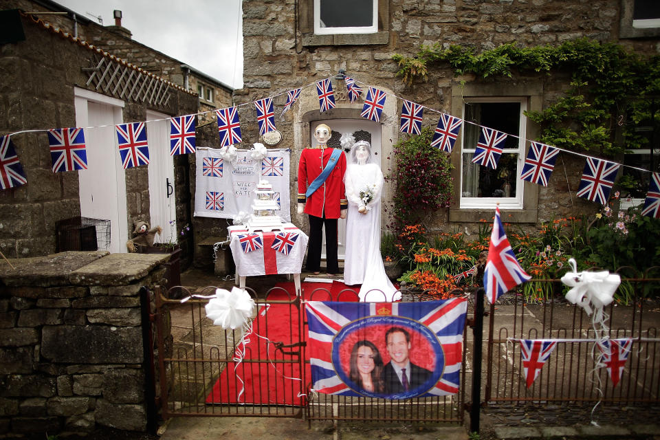 Scarecrows dressed as Prince William, Duke of Cambridge and Catherine, Duchess of Cambridge stand as part of the annual scarecrow festival.