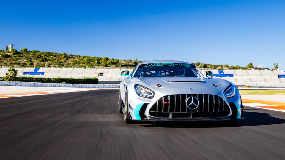 Driving the Mercedes-AMG GT2 race car on track.