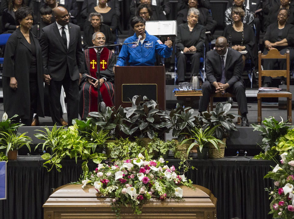 NASA astronaut Dr. Yvonne Cagle speaks at a memorial service for Katherine Johnson on Saturday, March 7, 2020, at Hampton University Convocation Center in Hampton, Va. Johnson, a mathematician who calculated rocket trajectories and earth orbits for NASA’s early space missions and was later portrayed in the 2016 hit film “Hidden Figures,” about pioneering black female aerospace workers died on Monday, Feb. 24, 2020. She was 101. (Kaitlin McKeown /The Virginian-Pilot via AP)