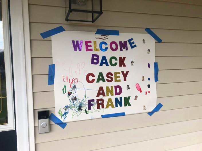 sign hanging up on wall that says &quot;welcome back Casey and frank&quot;