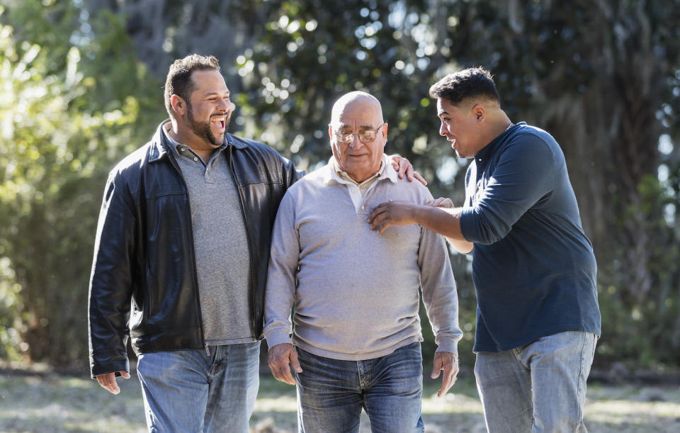 Three men walking together