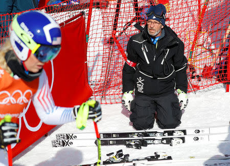 Heinz Haemmerle, or "Magic Heinzi" as US skier Lindsey Vonn calls her Austrian-born ski technician, looks at the world's most successful skiing woman before the start of Vonn's third Olympic Downhill training run at the Winter Olympics 2018 in Pyeongchang, South Korea February 20, 2018. REUTERS/Leonhard Foeger