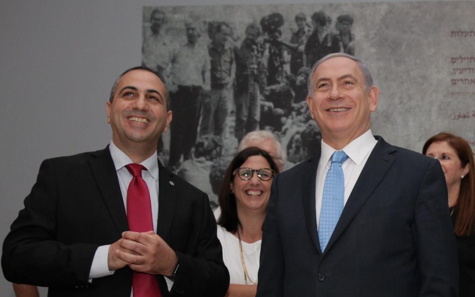 Avner Avraham, a former Mossad officer, left, with Israeli Prime Minister Benjamin Netanyahu  - Avner Avraham / Spy Legends Agency 