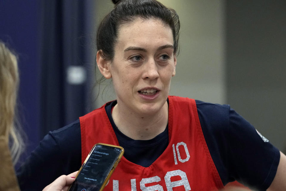 FILE - Team USA basketball player Breanna Stewart talks to the media following a spring training practice session, Friday, April 1, 2022, in Minneapolis. For the elite athletes in the WNBA, spending the offseason by playing in Russia can mean earning more money than they can make back home — sometimes even two or three times as much. “My experience in Russia has been amazing, to be honest,” said Breanna Stewart, who has played for Ekaterinburg since 2020. (AP Photo/Eric Gay, File)