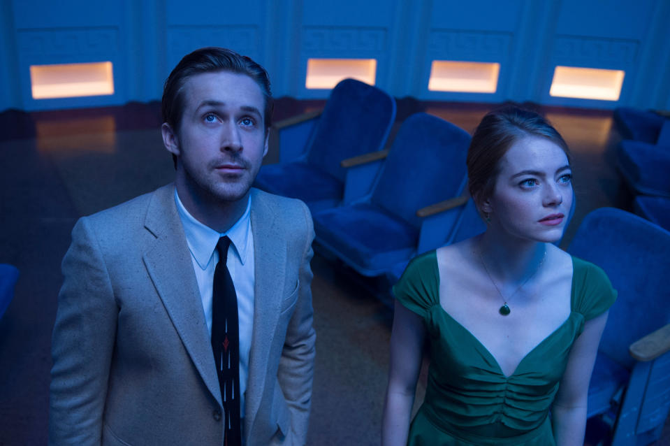 Ryan Gosling and Emma Stone looking up