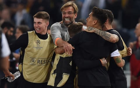 Jurgen Klopp celebrates with his players - Credit: GETTY IMAGES