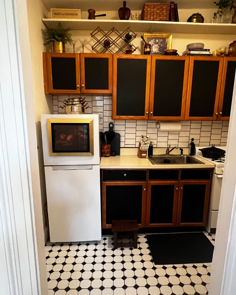 Black peel and stick on cabinets.