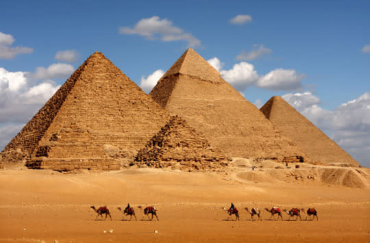 PYRAMIDS OF GIZA In the desert south of Cairo, three enormous pyramids testify to the legacy of the pharaohs of Ancient Egypt. The Pyramid of Khufu, commonly known as the Great Pyramid of Giza, is the largest of the three and the oldest of the Seven Wonders of the Ancient World (as well as the only one still in existence). Khafre and Menkaure (Khufu’s grandson) built the two smaller pyramids. The Great Sphinx stands guard at the entrance of the complex, which includes smaller pyramids belonging to female members of the dynasty and tombs for their relatives and courtiers. Insider Tip: Access to the interior of the pyramids is on a rotating basis. Inquire at the ticket office; from there, you can take a tram to the site and explore on foot. (Photo: sculpies/Shutterstock)