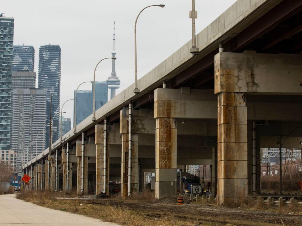 Advocates pushing for city council to dig into the costs of the Gardiner East project say they will push mayoral byelection candidates an issue in the upcoming race. The elevated highway is seen here from Martin Goodman Trail on March 22, 2023.  (Michael Wilson/CBC - image credit)