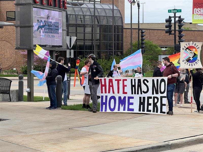 LGBTQ advocates protest right outside the Oshkosh Convention Center.