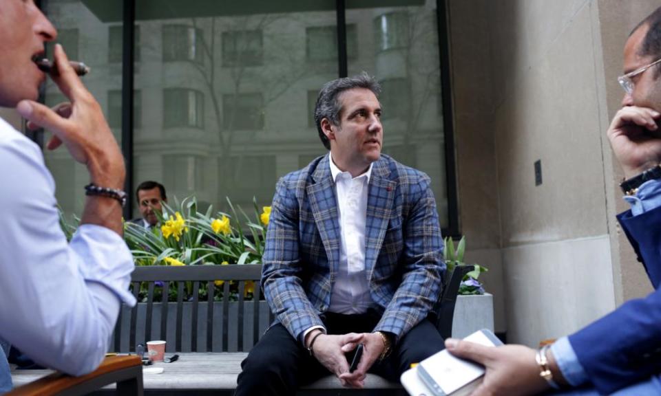 Michael Cohen, chats with friends on Park Avenue in April.