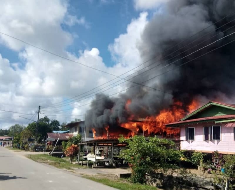 The fire at its height in Kampung Lintang, Balingian, this morning, May 12, 2021. — Picture courtesy of the Mukah Bomba station