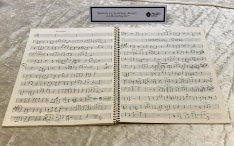 Sheet music once belonging to Lennon - Credit: MAURIZIO GAMBARINI/AFP/Getty Images