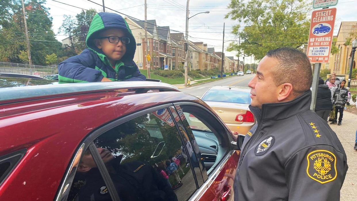 Chief with kid in window